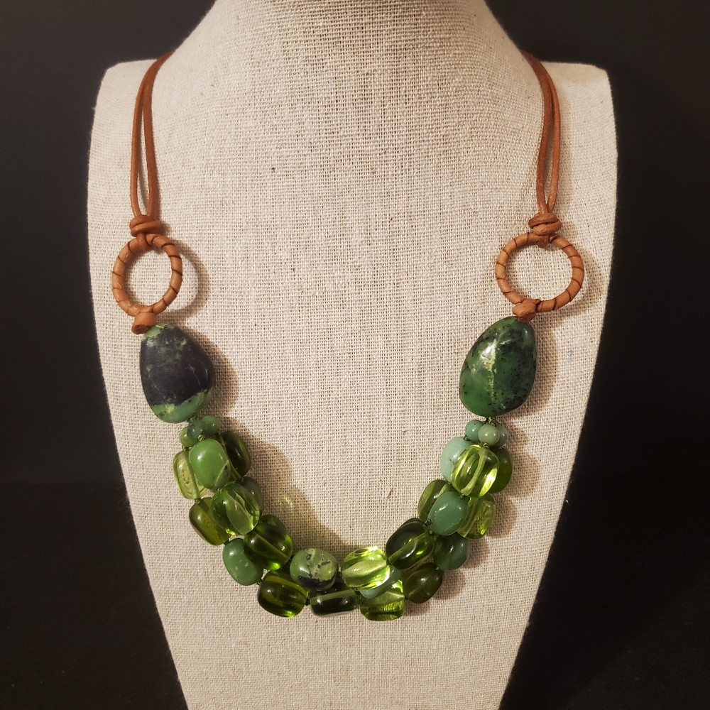 Green beaded leather, jade, gemstone, and glass necklace